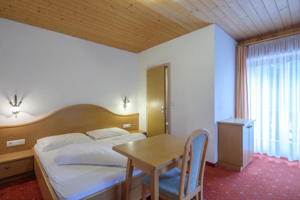 Postel nebo postele na pokoji v ubytování Gasthof Löwen