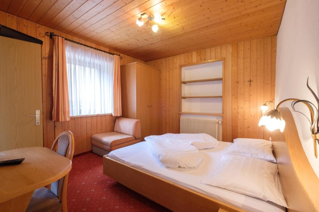 Postel nebo postele na pokoji v ubytování Gasthof Löwen