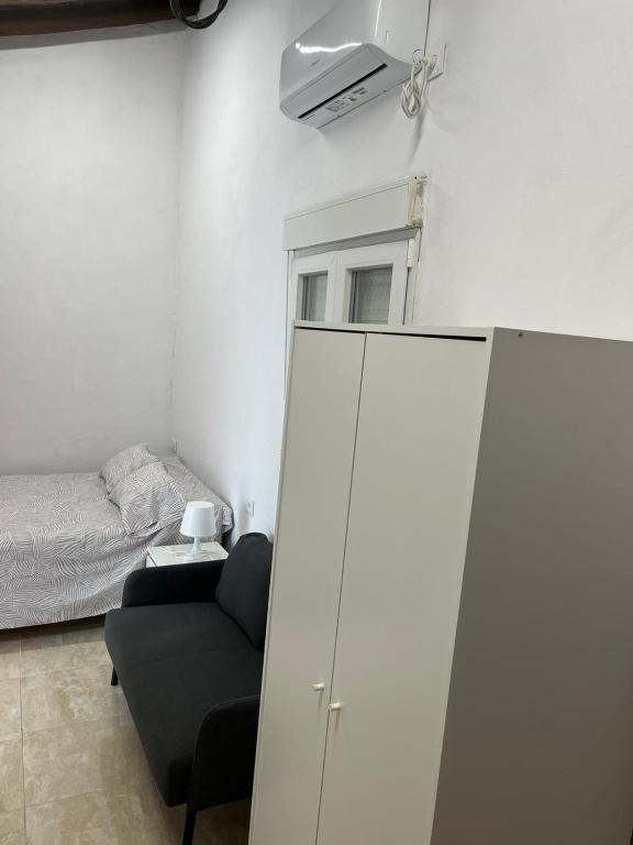 Posteľ alebo postele v izbe v ubytovaní El Tabanquito