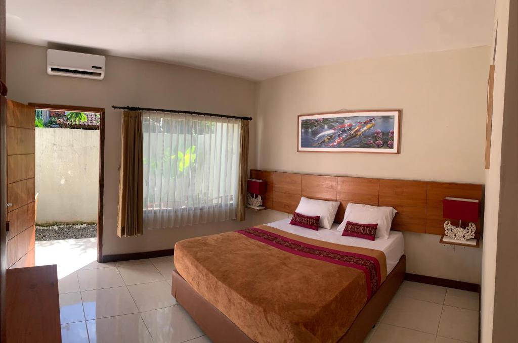 Kuta Suci Guesthouse - Superior Double Room