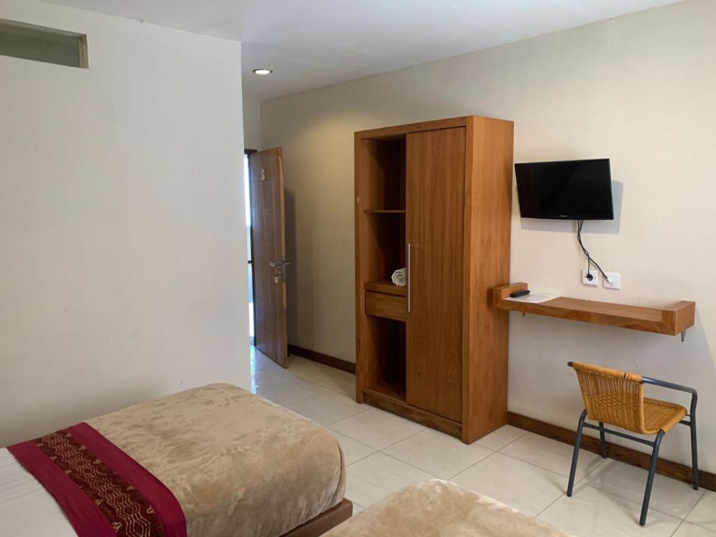 Kuta Suci Guesthouse - Superior Twin Room