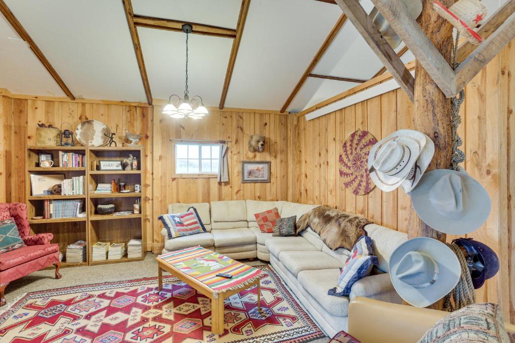 a living room with a couch and a table at Black Hills Vacation Rental 25 Mi to Mt Rushmore! in Hermosa