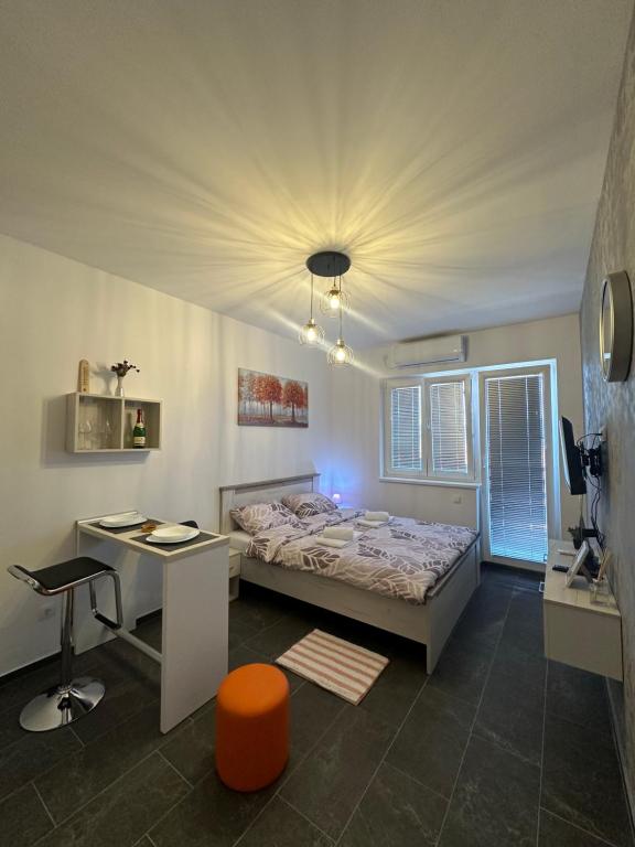 Voodi või voodid majutusasutuse Apartman Aleks toas