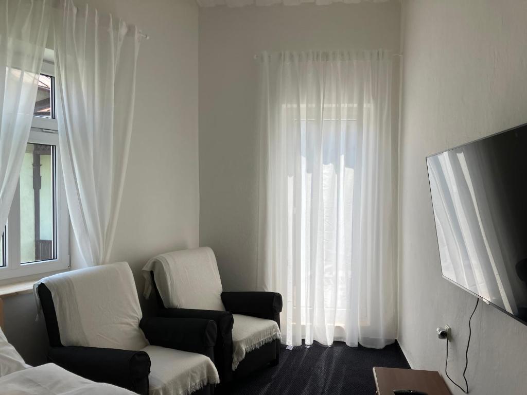 TV a/nebo společenská místnost v ubytování Apartmány Windy