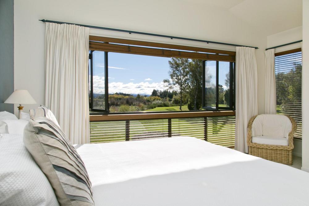 Voodi või voodid majutusasutuse Tongariro Lodge toas
