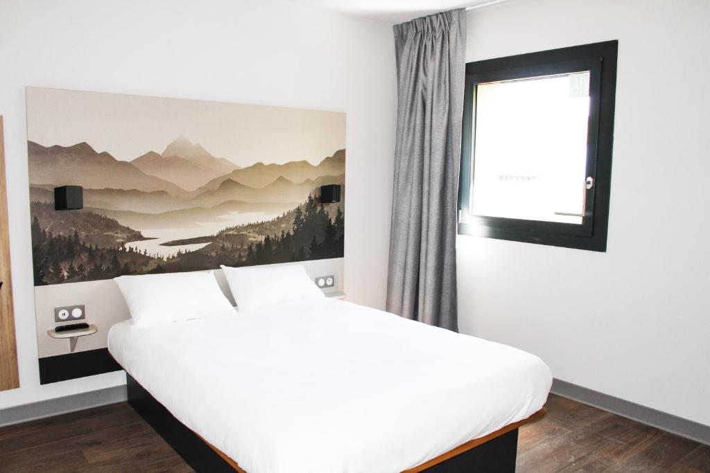 Posteľ alebo postele v izbe v ubytovaní B&B HOTEL Aix-les-Bains