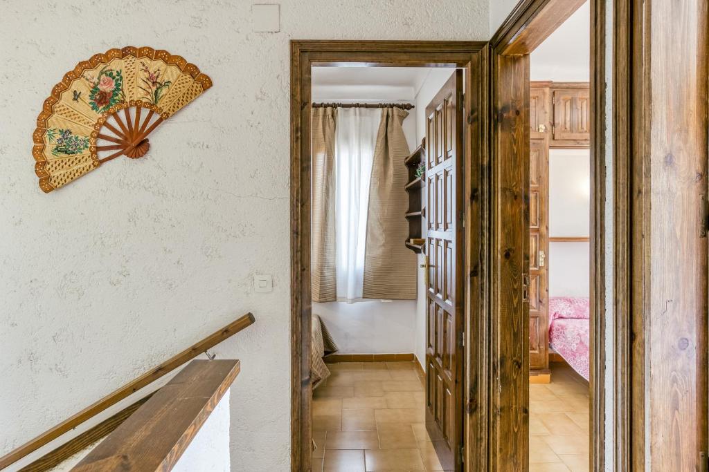 A bed or beds in a room at Casa Saguer