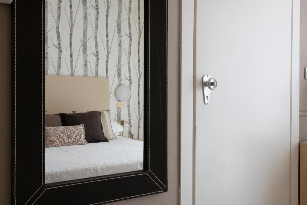 Postel nebo postele na pokoji v ubytování Hotel Maarea