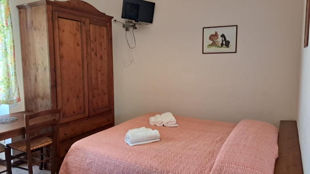 Postel nebo postele na pokoji v ubytování Antico Borghetto - Casa Vacanze