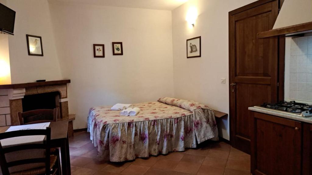 Postel nebo postele na pokoji v ubytování Antico Borghetto - Casa Vacanze