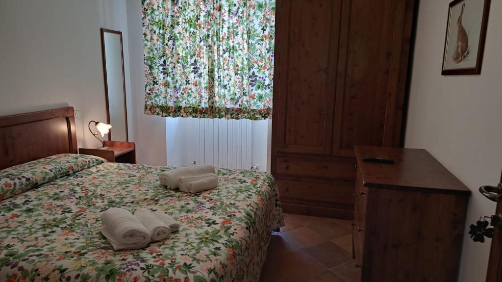 Postel nebo postele na pokoji v ubytování Antico Borghetto - Casa Vacanze