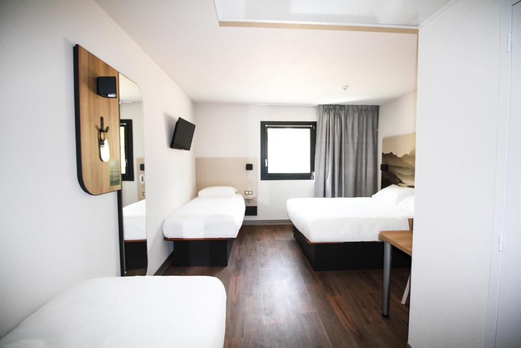 Posteľ alebo postele v izbe v ubytovaní B&B HOTEL Aix-les-Bains