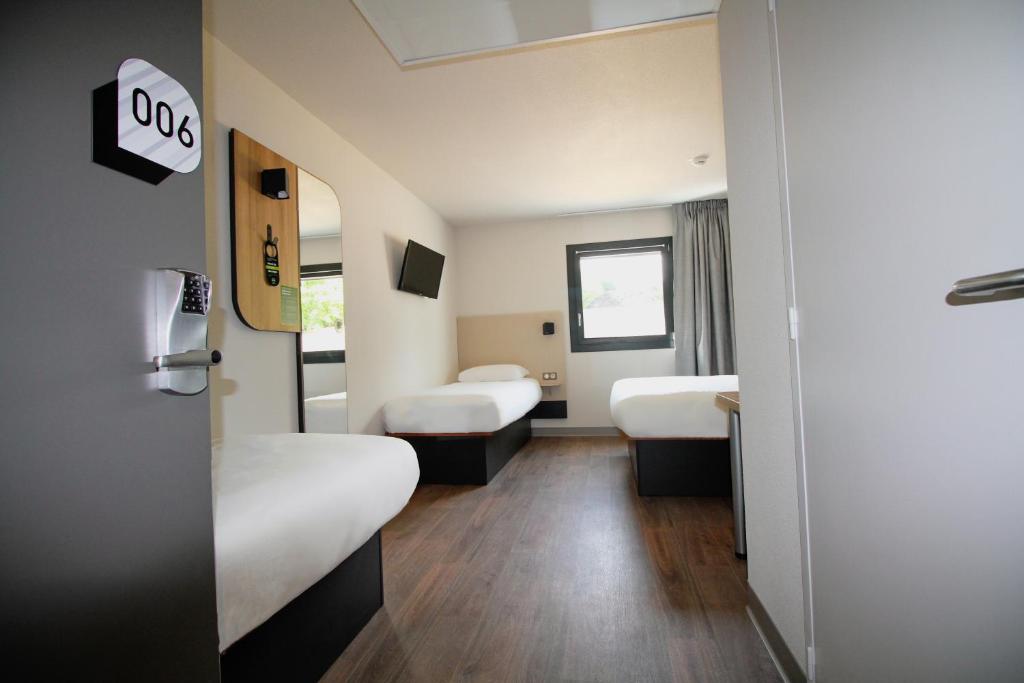 Posteľ alebo postele v izbe v ubytovaní B&B HOTEL Aix-les-Bains
