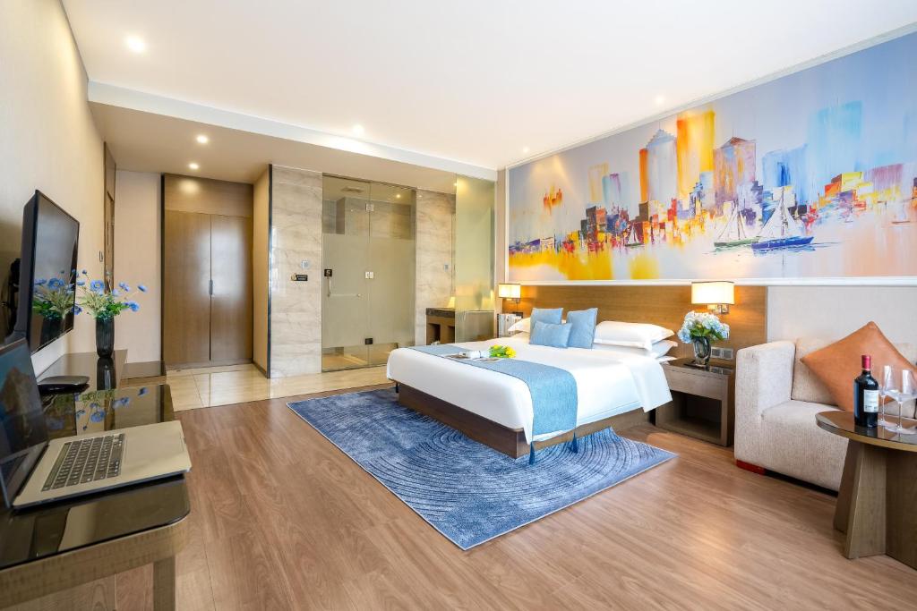 TV a/nebo společenská místnost v ubytování Zhongshan Bafei Hotel