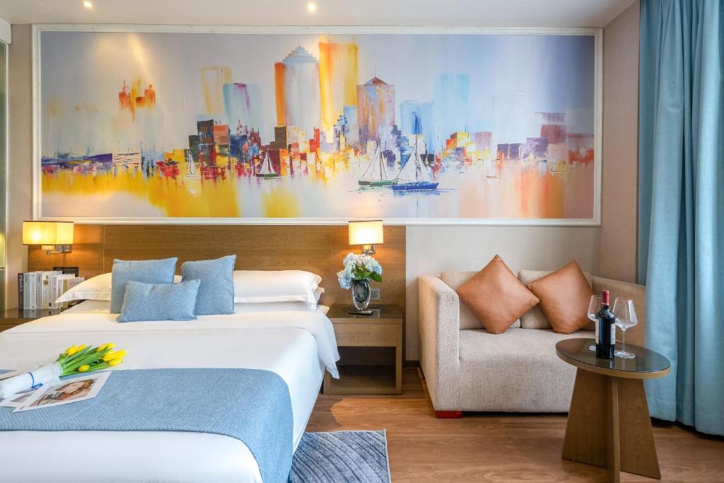 Postel nebo postele na pokoji v ubytování Zhongshan Bafei Hotel