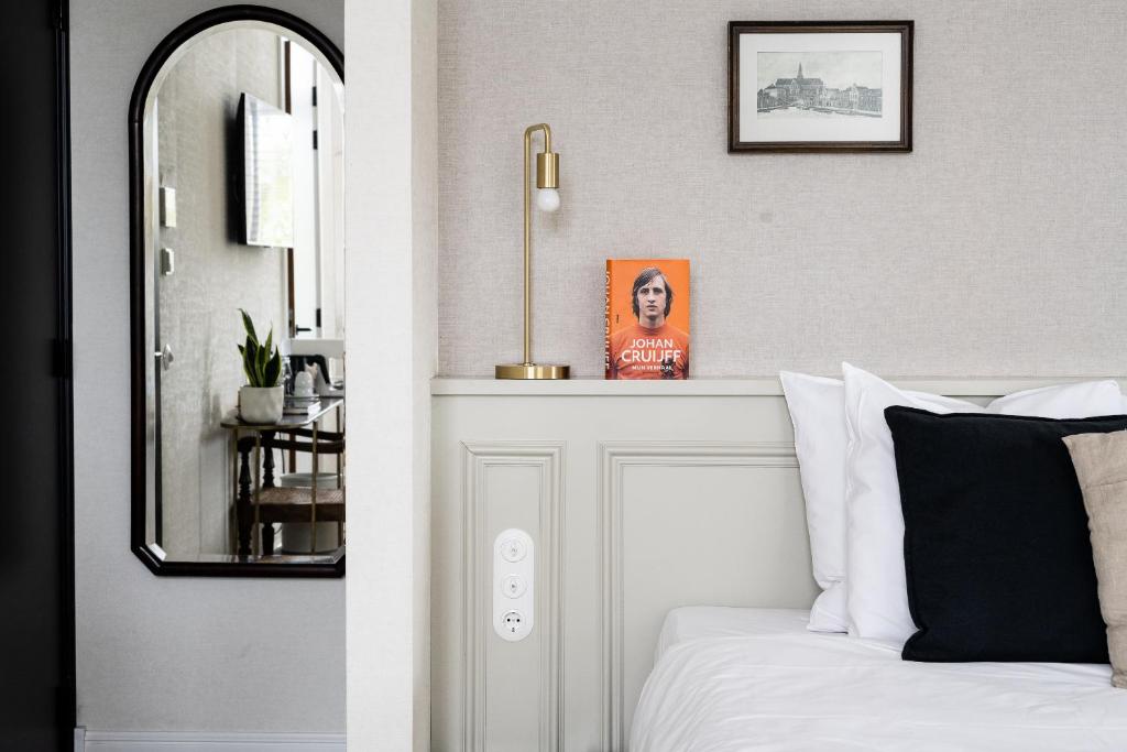 Postel nebo postele na pokoji v ubytování Ysbrantsz Boutique Hotel