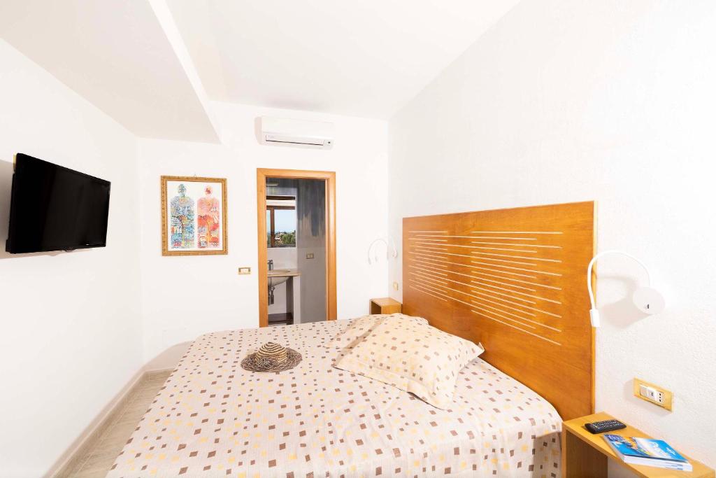 A bed or beds in a room at A Casa di Anna by BarbarHouse