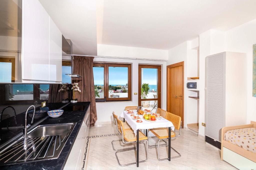 A kitchen or kitchenette at A Casa di Anna by BarbarHouse