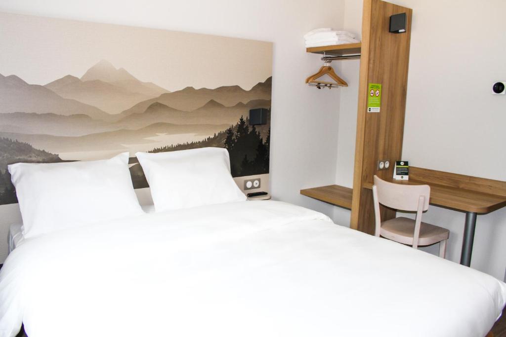 Posteľ alebo postele v izbe v ubytovaní B&B HOTEL Aix-les-Bains