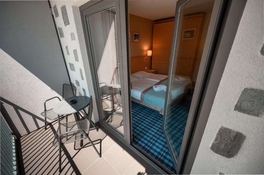 Postelja oz. postelje v sobi nastanitve Wellness Hotel Montis