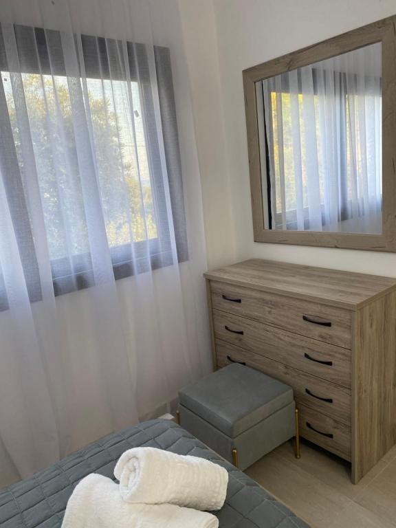Postel nebo postele na pokoji v ubytování Villa Loukas