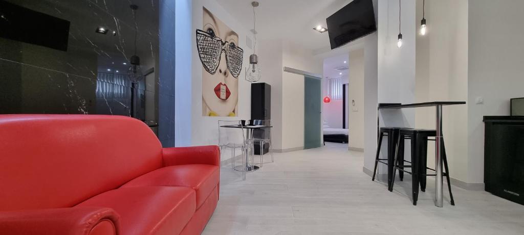 TV a/nebo společenská místnost v ubytování Puerto Principe LOFT