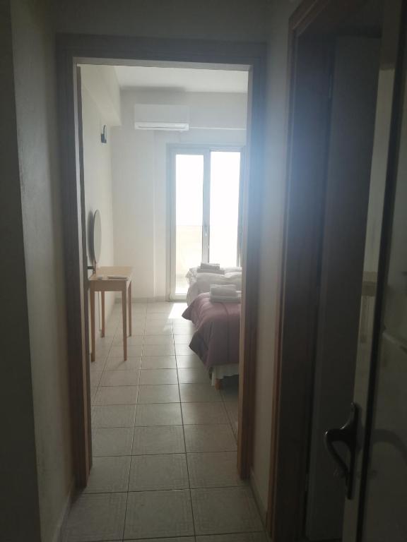 Postel nebo postele na pokoji v ubytování Filanthi CostaS