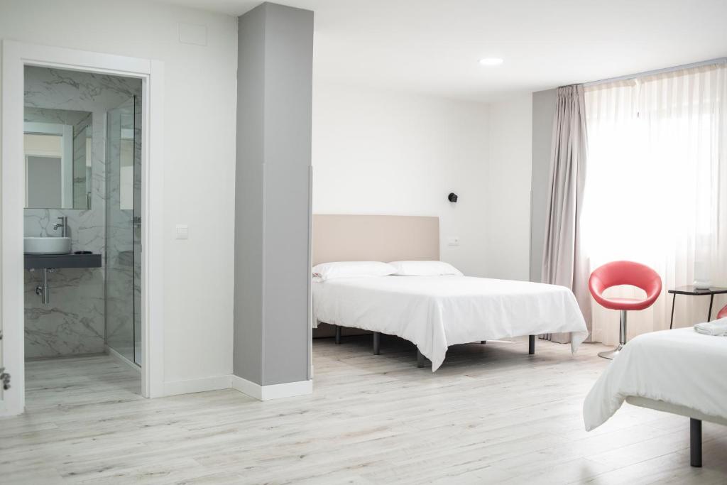 Postel nebo postele na pokoji v ubytování Hotel Montañés