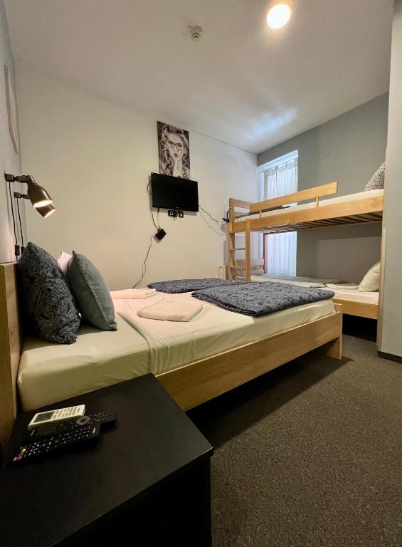 Postel nebo postele na pokoji v ubytování Himalayan Hostel
