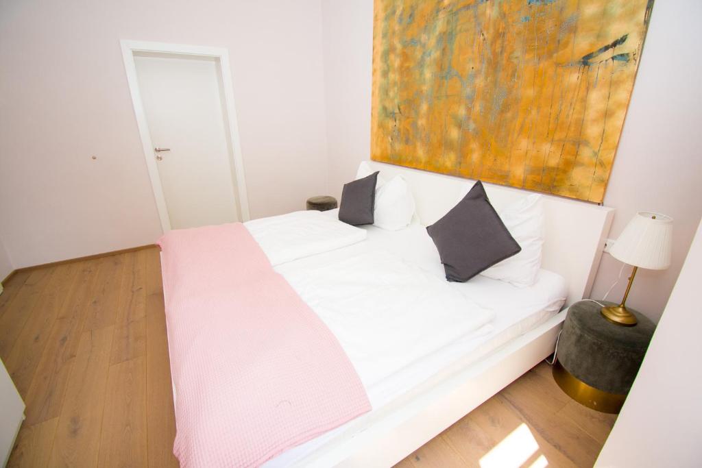 Postel nebo postele na pokoji v ubytování Das Torhaus