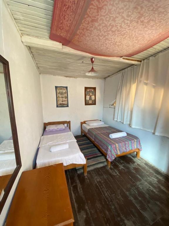 Postel nebo postele na pokoji v ubytování Medusa Camping