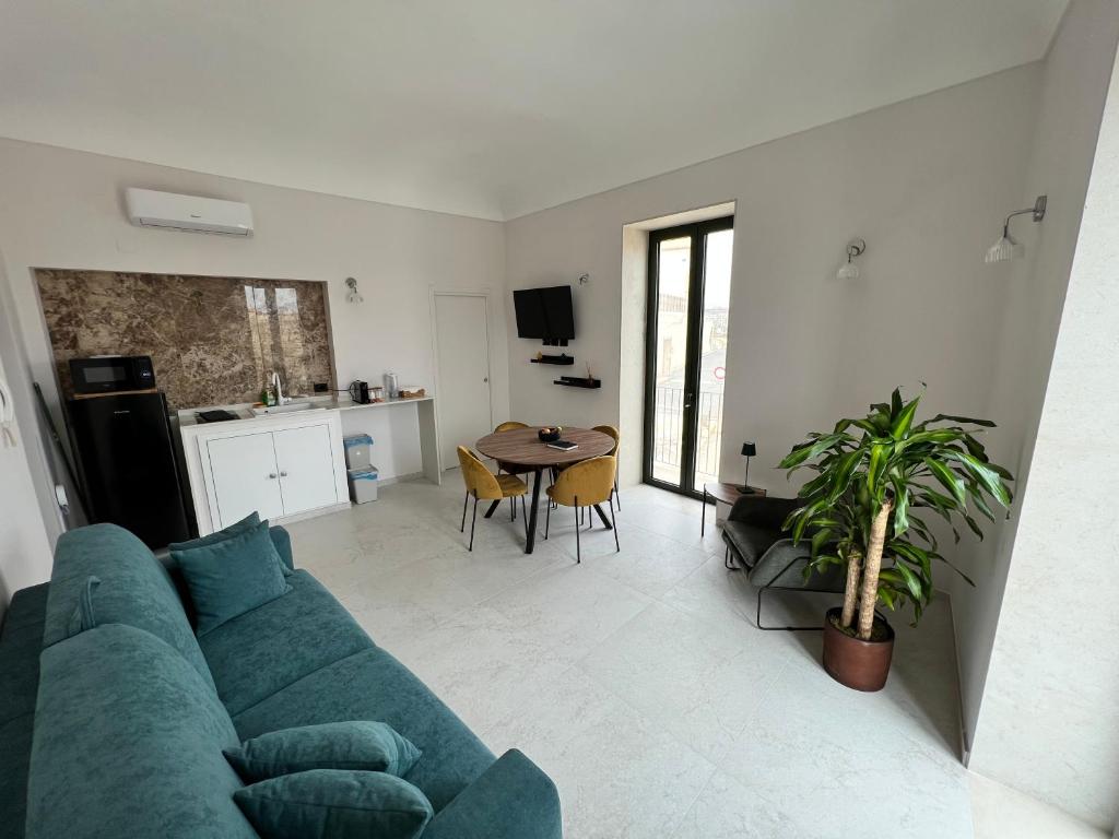 Televízia a/alebo spoločenská miestnosť v ubytovaní La Casa Di Chloe