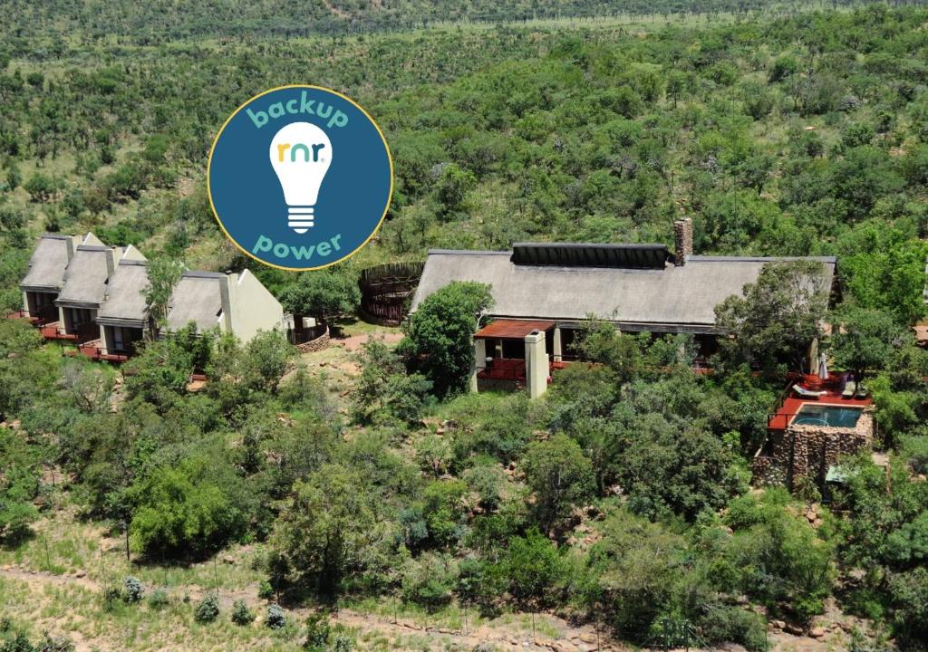 an overhead view of a house with a light bulb at Iwa Imfene Pvt Game Lodge, Welgevonden IMW2 in Welgevonden Game Reserve