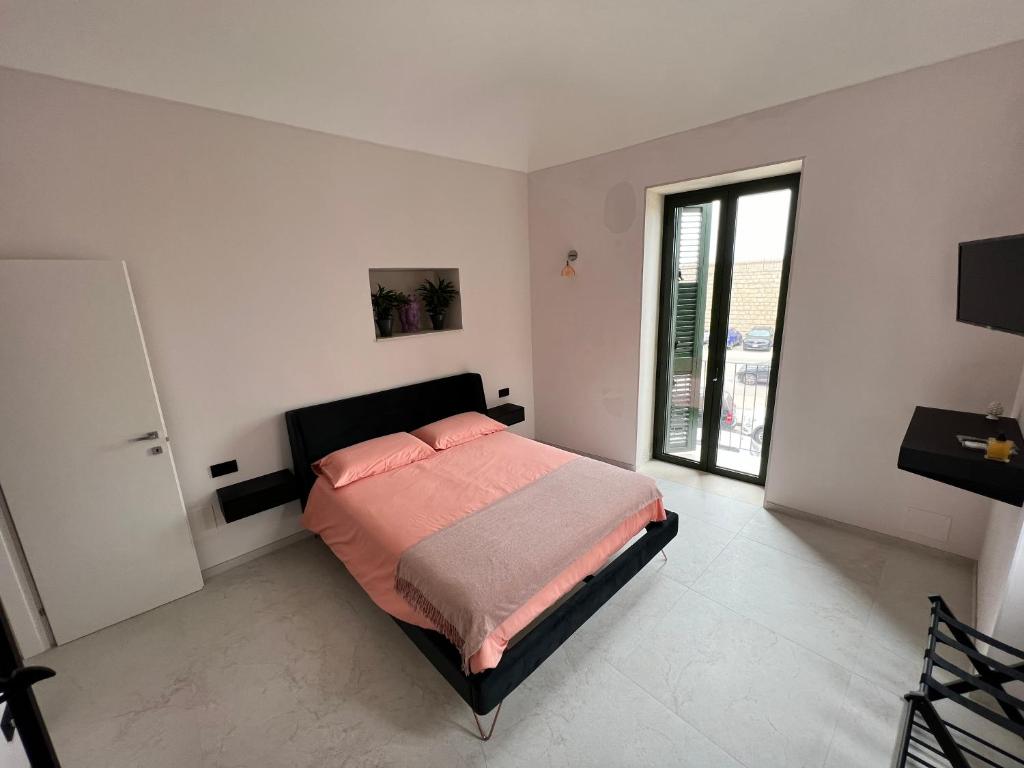 Posteľ alebo postele v izbe v ubytovaní La Casa Di Chloe
