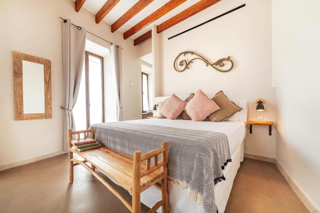 Postel nebo postele na pokoji v ubytování Ōrigins Hotel Boutique - Adults Only