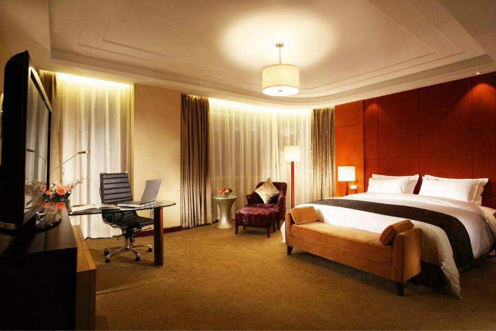 TV a/nebo společenská místnost v ubytování Tianjin Saixiang Hotel