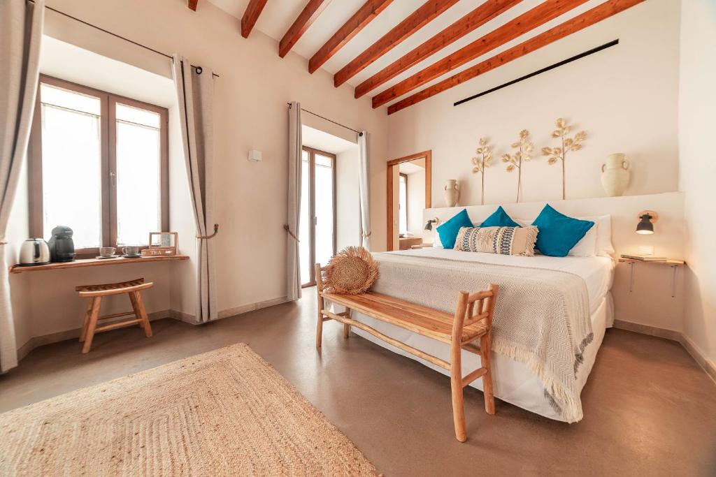 Postel nebo postele na pokoji v ubytování Ōrigins Hotel Boutique - Adults Only