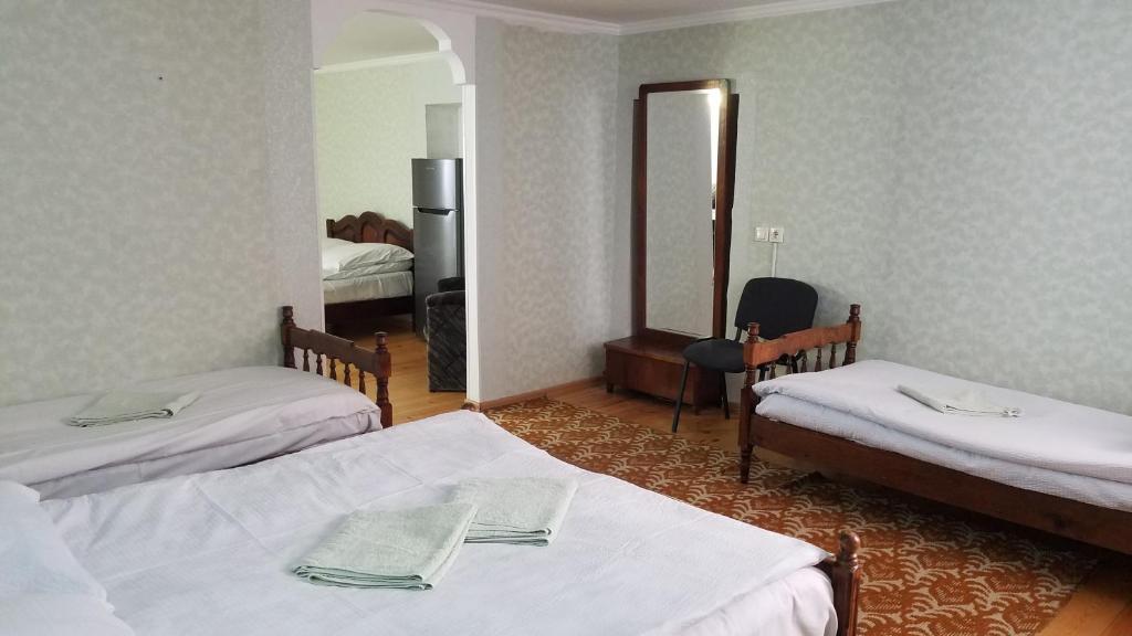 Postel nebo postele na pokoji v ubytování Guest House Green Rose