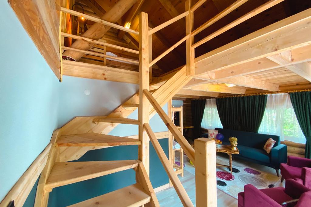 a loft bed in a tiny house at Kackarsan Vip wooden Suites in Rize