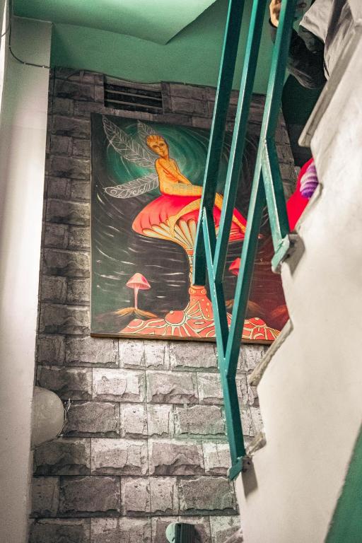 Palanda nebo palandy na pokoji v ubytování Pachamama Hostel