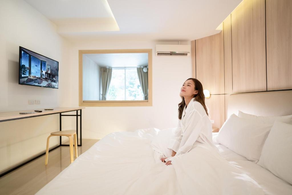 Postel nebo postele na pokoji v ubytování Bedline Hotel - SHA Certified