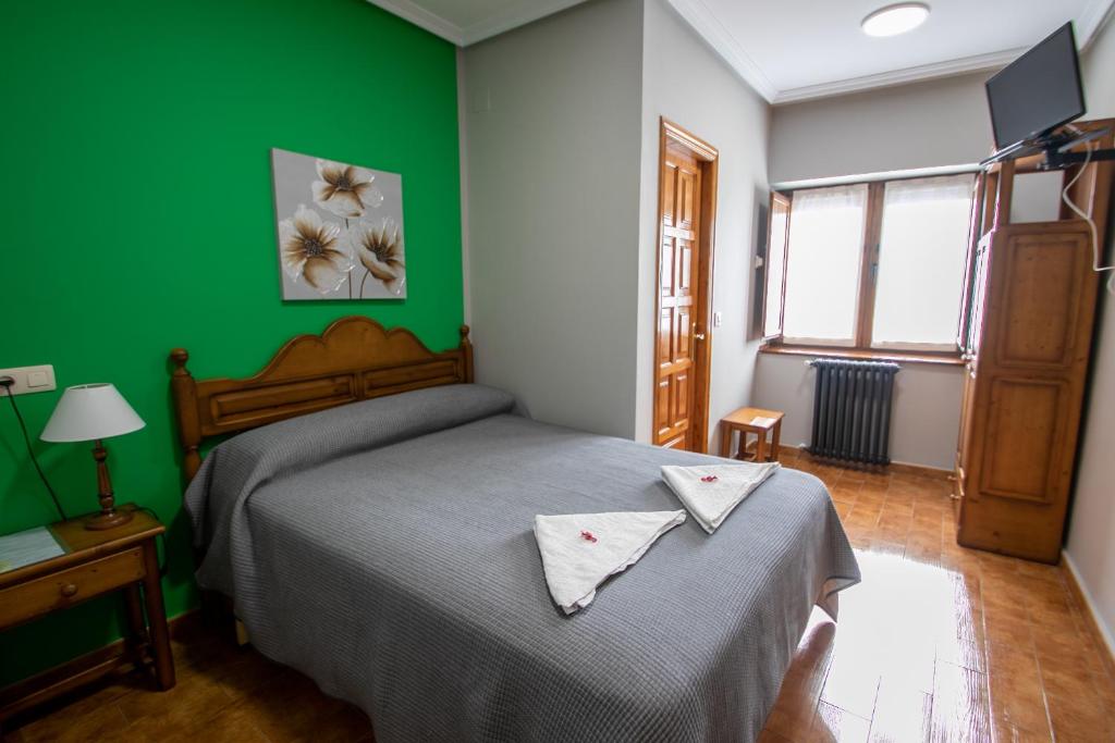 Postel nebo postele na pokoji v ubytování La Casona de Rey
