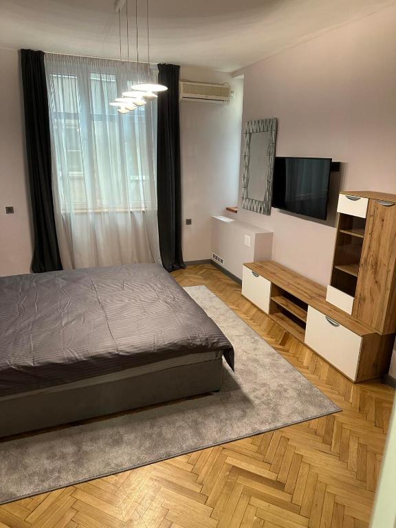 Postel nebo postele na pokoji v ubytování Lux apartments Top center