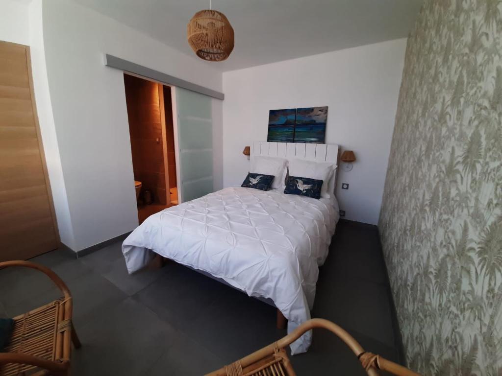 Postel nebo postele na pokoji v ubytování Le coin de mire