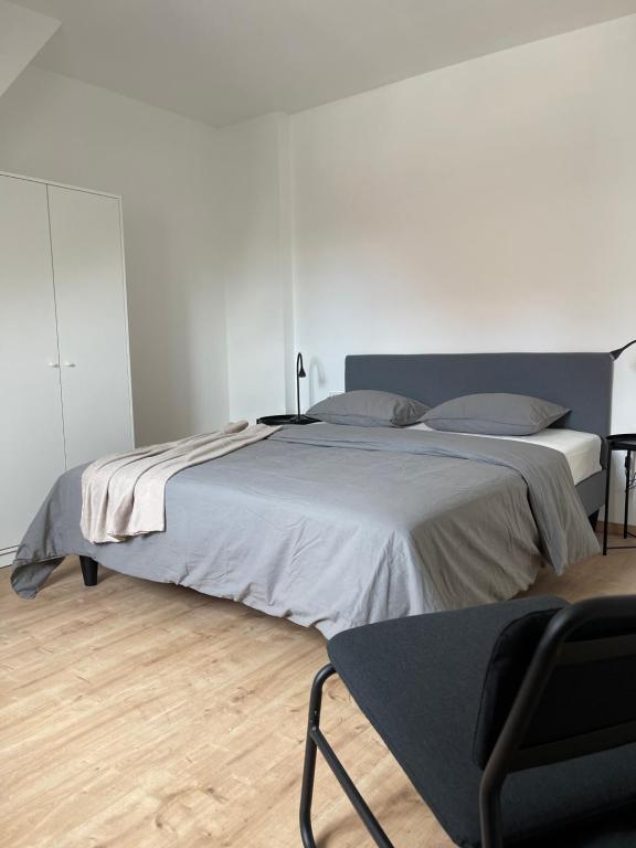 Postel nebo postele na pokoji v ubytování Freundliche Wohnung nähe Klagenfurt