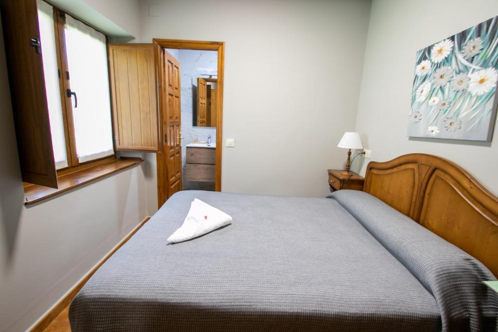 Postel nebo postele na pokoji v ubytování La Casona de Rey