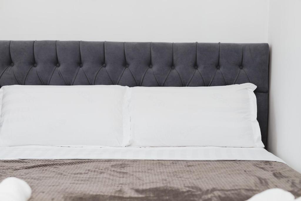 Postel nebo postele na pokoji v ubytování Hotel Tier Center