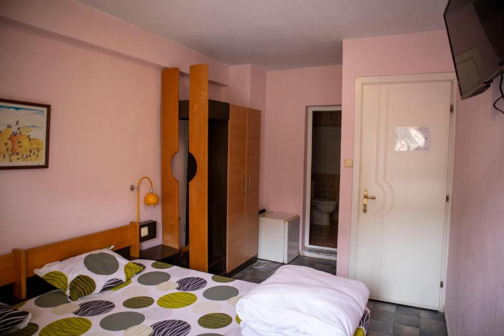 Postel nebo postele na pokoji v ubytování Hotel Balevurov