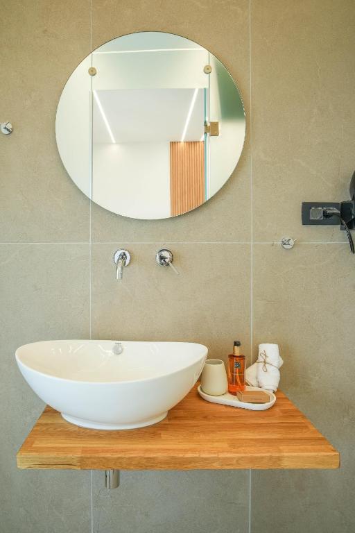 Koupelna v ubytování Omnia Deluxe Rooms