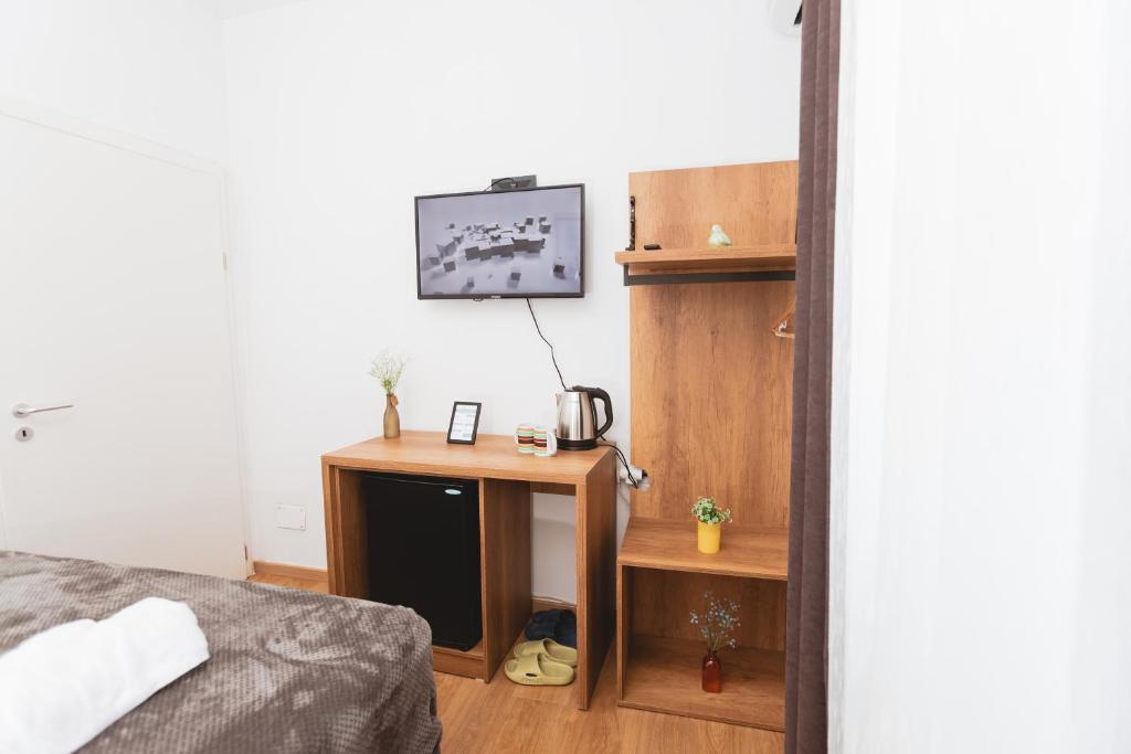 Postel nebo postele na pokoji v ubytování Hotel Tier Center
